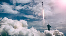 Cloudy Rocket Launch. The Elements Of This Image Furnished By NASA.