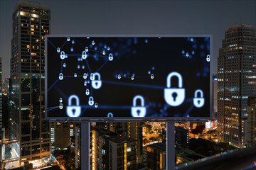 padlock icon hologram on road billboard over panorama city view of bangkok at night to protect busin