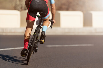 Wall Mural - Road bike cyclist man cycling, athlete on a race cycle