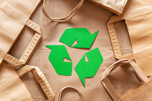 Recycled Packaging ,craft Packages For Packaging Goods From Online Stores, Eco Friendly Packaging Made Of Recyclable Raw Materials, Green Arrow Recycling Symbol