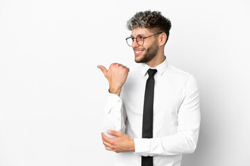 Business caucasian man isolated on white background pointing to the side to present a product