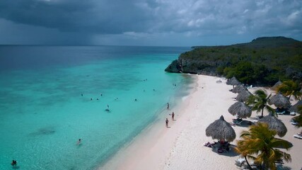 Wall Mural -  Cas Abou Beach on the Caribbean island of Curacao, Playa Cas Abou in Curacao Caribbean tropical white beach with the blue ocean. drone footage