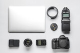 Fototapeta  - Modern photographer's equipment and laptop on light background