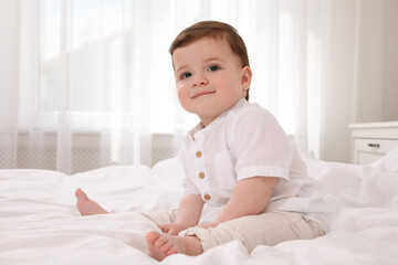 Poster - Cute baby boy on bed at home