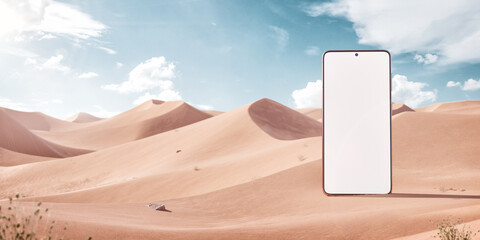 3d Illustration of aBig Smartphone With White Screen in the Middle of the Desert.