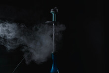 Blue Hookah In The Dark And Lots Of Smoke
