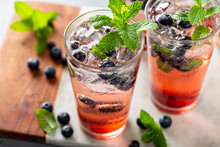 Blueberry Mojito In Tall Glasses With Mint