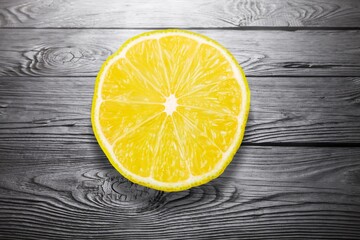 Canvas Print - Juicy yellow lemon slice on a background