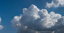  Beautiful Cumulus Clouds Against The Blue Sky.. Panoramic Shot Of A Cloud Cluster. Wide Format.