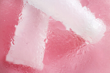  moisturizing skin care products. Face and hand cream under a glass surface with water on a pink background. spa cosmetic