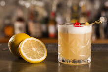 Amaretto Sour drink in a bar environment