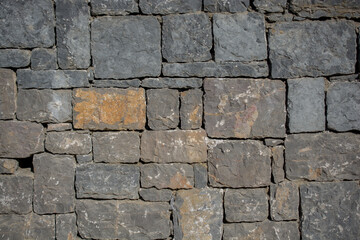 Wall Mural - Wall made of the same type and same color of stones