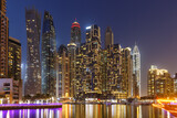 Fototapeta Nowy Jork - Dubai Marina skyline architecture buildings travel at night twilight in United Arab Emirates