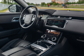 Poster - Modern car interior with the leather panel, and dashboard