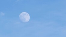 Blue Sky On Daytime With A Half Of The Moon. Close Up And Soft Focus. Rising Moon