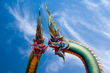 Wall Mural - Twin Stucco painted as a large serpent at Pra kai keaw wang nakin, Located at Ban Don swan, Phen District, Udon Thani, Thailand.