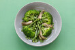 © ADDICTIVE STOCK - Closeup viewed from above of a vegetable dish with broccoli, mushrooms and peas