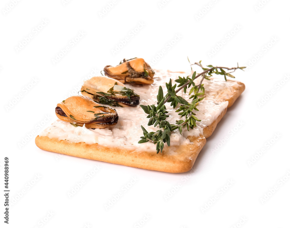 Tasty cracker with mussels and thyme on white background