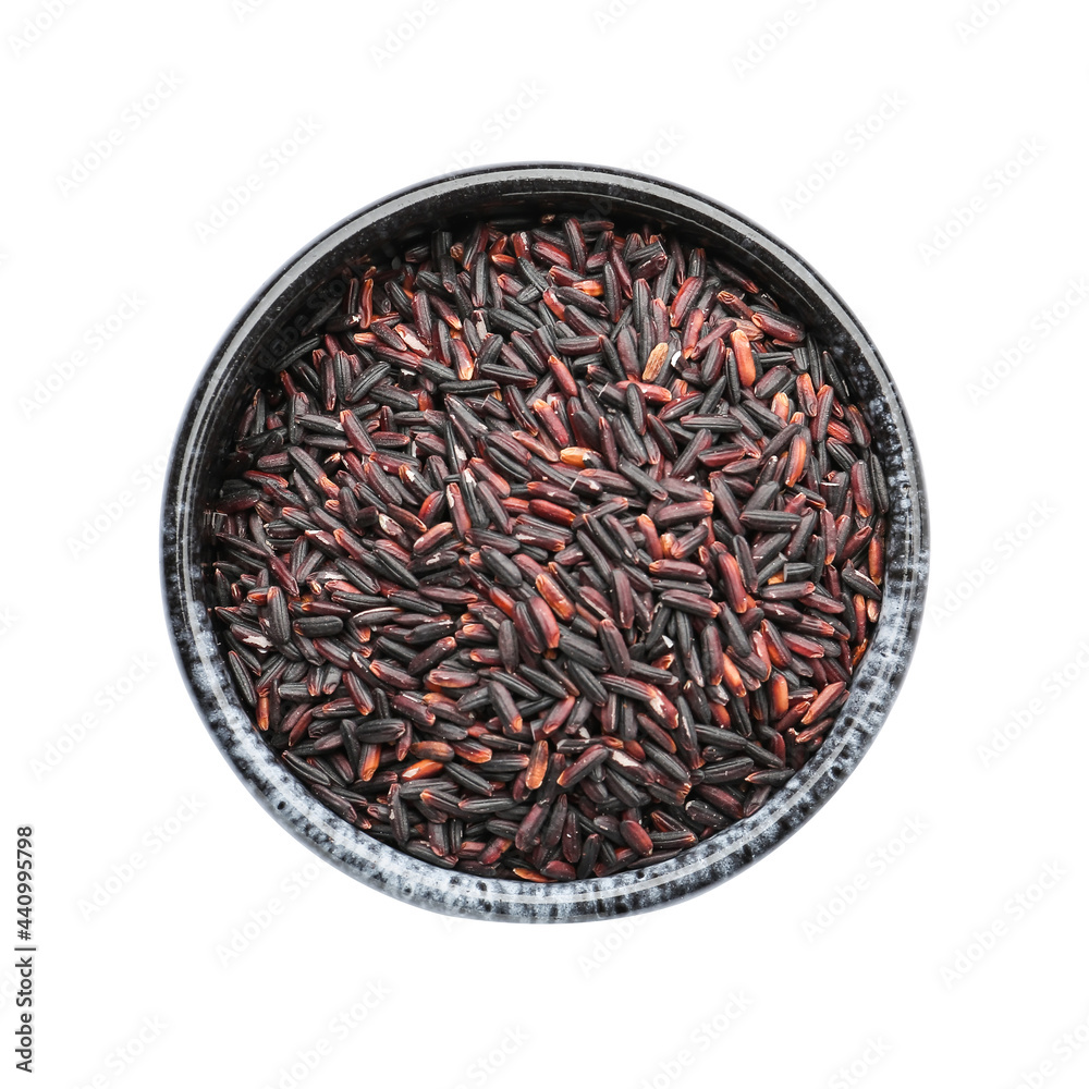 Bowl with black wild rice on white background
