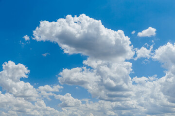 Wall Mural - blue clear sky with white fluffy clouds. natural background.