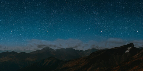 Wall Mural - mountain. backgrounds night sky with stars and moon and clouds.