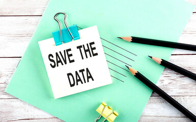 Poster - Text TIME TO SAVE MONEY on the short note with pencils on the wooden background