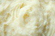 © Atlas - Tasty mashed potatoes on whole background, close up