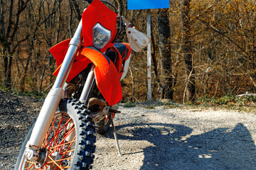 Close-up details of cross motorcycle parked on ground