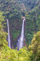 Sticker - Scenic waterfalls in the middle of a forest in Pakse, Laos, Southeast Asia