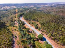 Aerial View Of A Road With Traffic In Alentejo Countryside On Hilltop, Alentejo, Portugal.