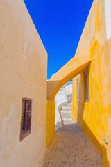 Wall Mural - Greece Santorini island in Cyclades, traditional view of white washed houses with colorful wooden frames