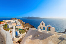 Stunning Cupolas With The Caldera (volcano) In The Distance In The Greek Island Of Santorini