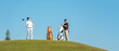 © freebird7977 - Group golfer sport course golf ball fairway.  People lifestyle playing game golf tee off on the green grass.  Asian man with friend player game shot in summer