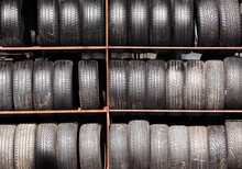 Old Used Tires On Rack