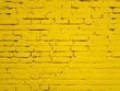 © the_pixel - Yellow wall brick background texture image.