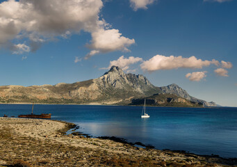 Wall Mural - Anchored sailboat  on the islet of Gramvousa on the northwest coast of the Greek island of Crete