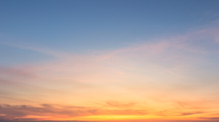 Wall Mural - beautiful vivid sky painted by the sun leaving bright golden shades.dense clouds in twilight sky in 