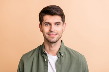 Poster - Photo of charming attractive young man face good mood smile isolated on pastel beige color background