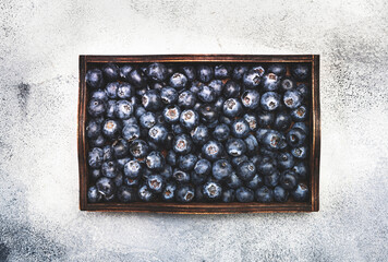 Wall Mural - Ripe large blueberries with water drops, food background, close-up