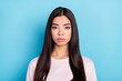 © deagreez - Photo of young attractive asian korean girl serious confident long brown hair isolated over blue color background