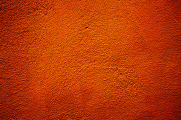 Wall Mural - Orange colored abstract wall background with textures of different shades of orange and orange red