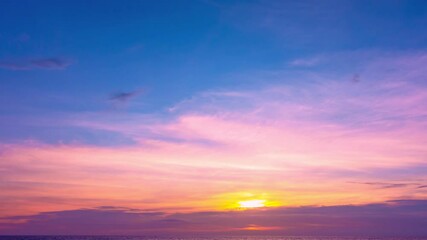 Wall Mural - 4K Time lapse of Colorful sunset or sunrise landscape Amazing light of nature cloudscape sky and Clouds moving away rolling 4k colorful dark sunset clouds Footage timelapse Stunning sky and clouds