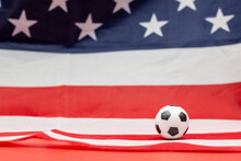 Soccer Ball With Flag Of America Background