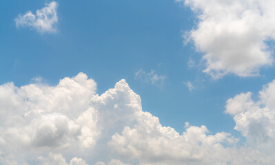 Wall Mural - white fluffy clouds on blue sky. soft touch feeling like cotton. white puffy cloudscape. beauty in n