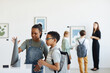 © Seventyfour - Minimal portrait of schoolchildren visiting art gallery and looking at modern sculptures, copy space
