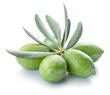 Green natural olives with leaves isolated on a white background.