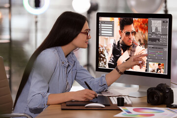 Poster - Professional retoucher working on computer in office