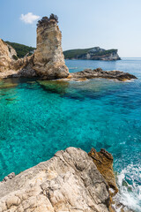 Wall Mural - Turquoise water in Mesovrika bay on the north eastern coast of the Greek island of Antipaxos in the Ionian Sea