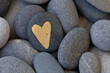 Golden Heart On Grey Pebble