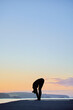© JORGE CORCUERA - vertical image with large copy space of Caucasian woman practicing yoga